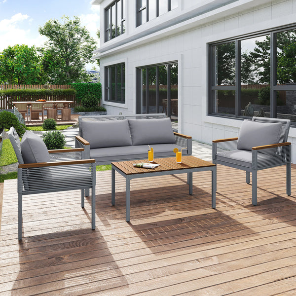 Salon MERA 4 pièces gris en configuration jardin – Canapé, fauteuils et table basse en situation réelle