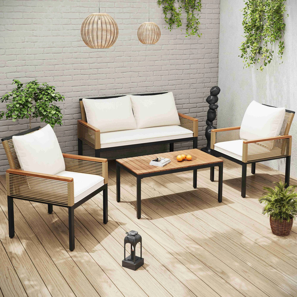 Salon de jardin MERA 4 pièces en rotin et bois, coussins beige – Installation extérieure sur terrasse ensoleillée