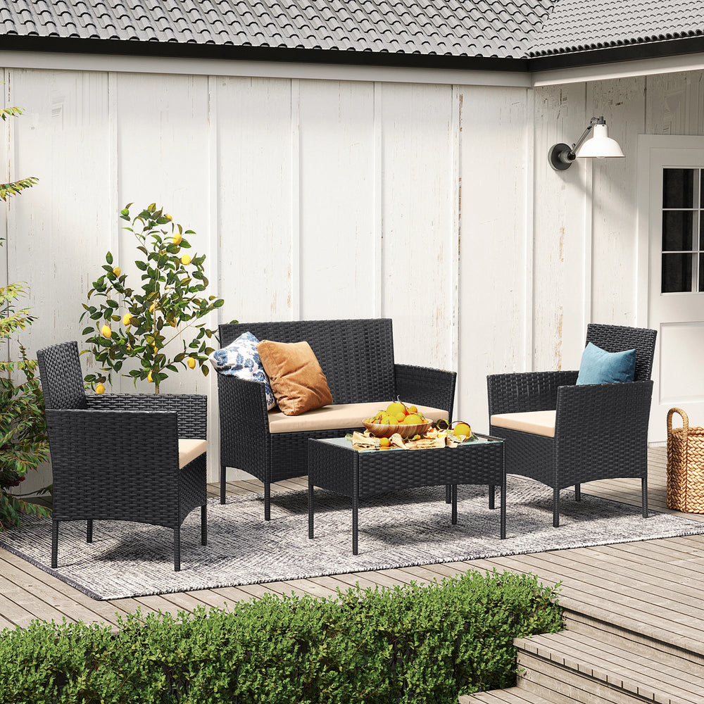 Salon de jardin PLOA 4 pièces en osier marron installé en extérieur – Ambiance terrasse naturelle