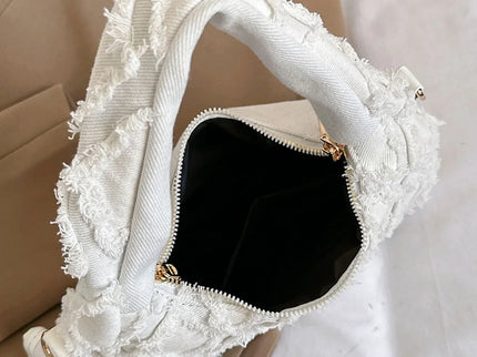 ouverture sac a main pose sur affaire style efilochee et brodee avec petite sacoche fermeture eclair