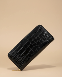 portefeuille femme ecaille crocodile croci noir fond uni