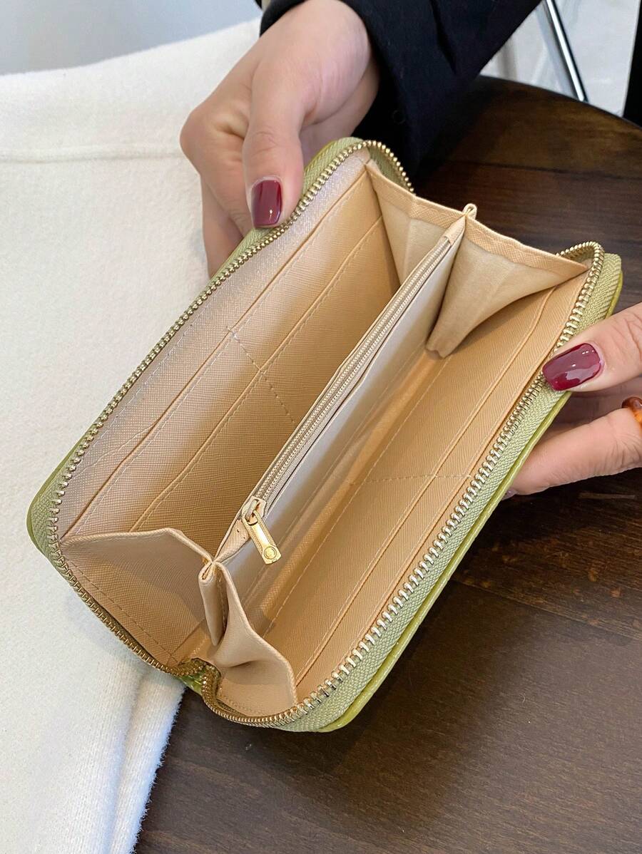 portefeuille femme ecaille crocodile croci vert interieur poche