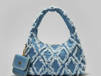 sac bleu brodee effilochee en jeans