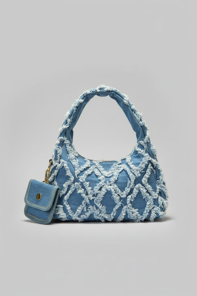 sac bleu brodee effilochee en jeans