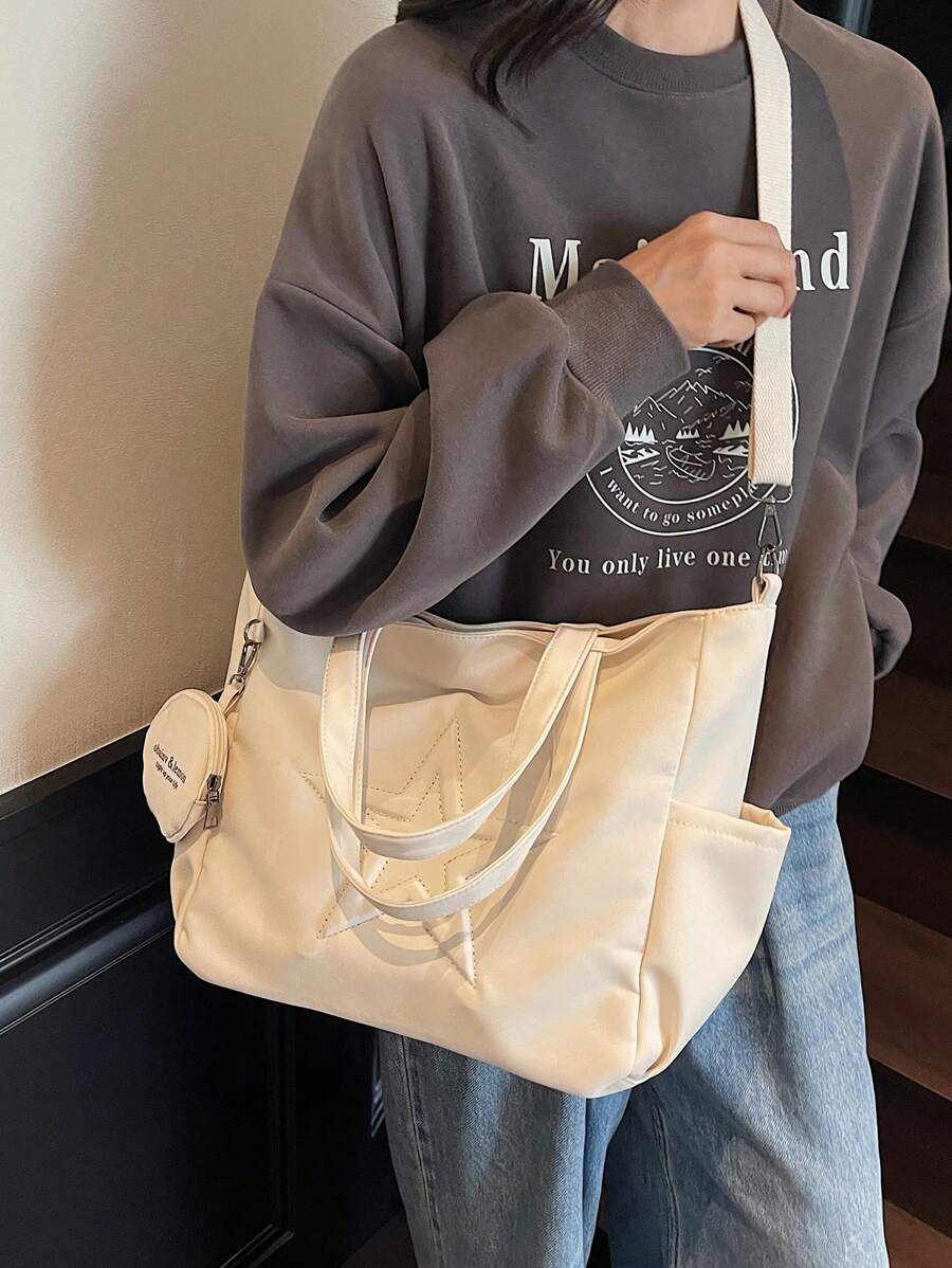 sac cabas en cuir beige pour femme detail sangle et grande sangle depuis devant deux sangle 