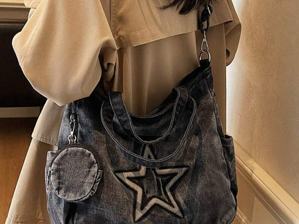 sac cabas en jeans noir pour femme porte de derriere de cote gauche finission etoiel