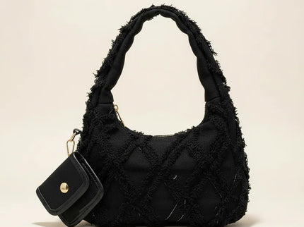 sac noir style effilochee brodee 