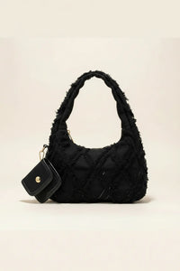 sac noir style effilochee brodee 